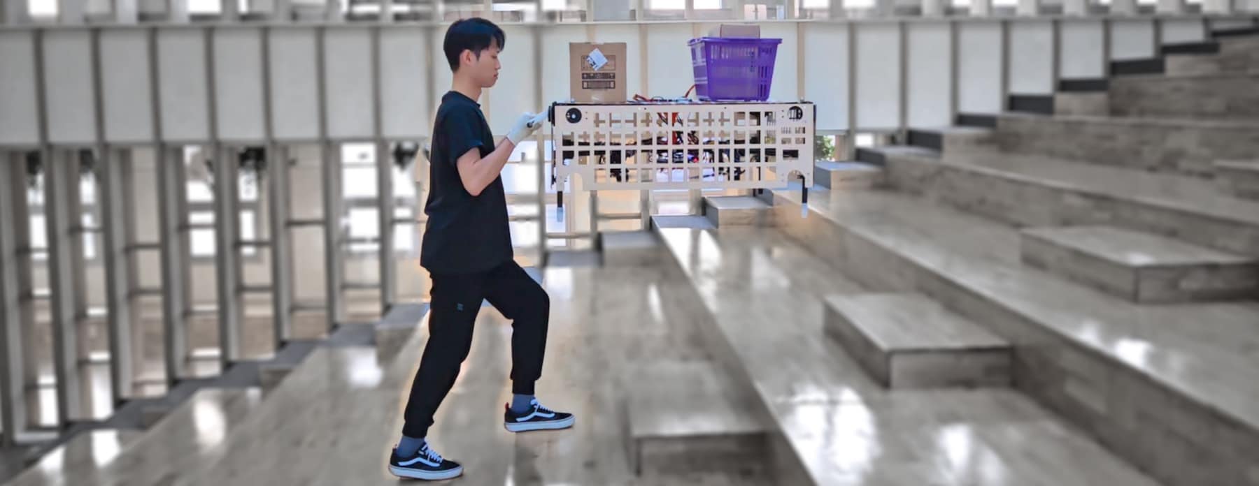 A man tests the flying shopping cart from South Korea.