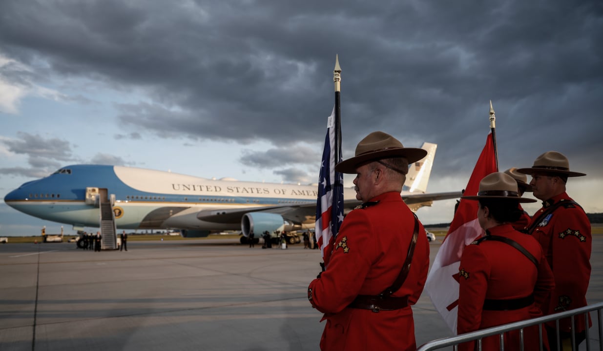 Mounties wait outside Air Force One as President Donald Trump arrives in Calgary, Alberta, on Sunday, June 15, 2025, to attend the G7 leaders' meeting in Kananaskis, Alberta.