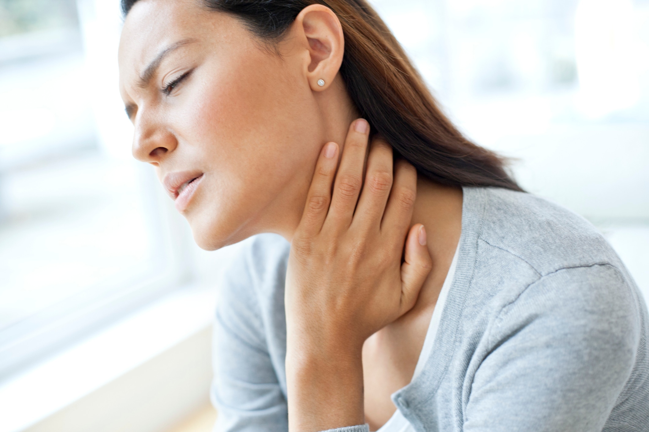 Side view, focus on the neck area, potential symptoms of Eagle syndrome.