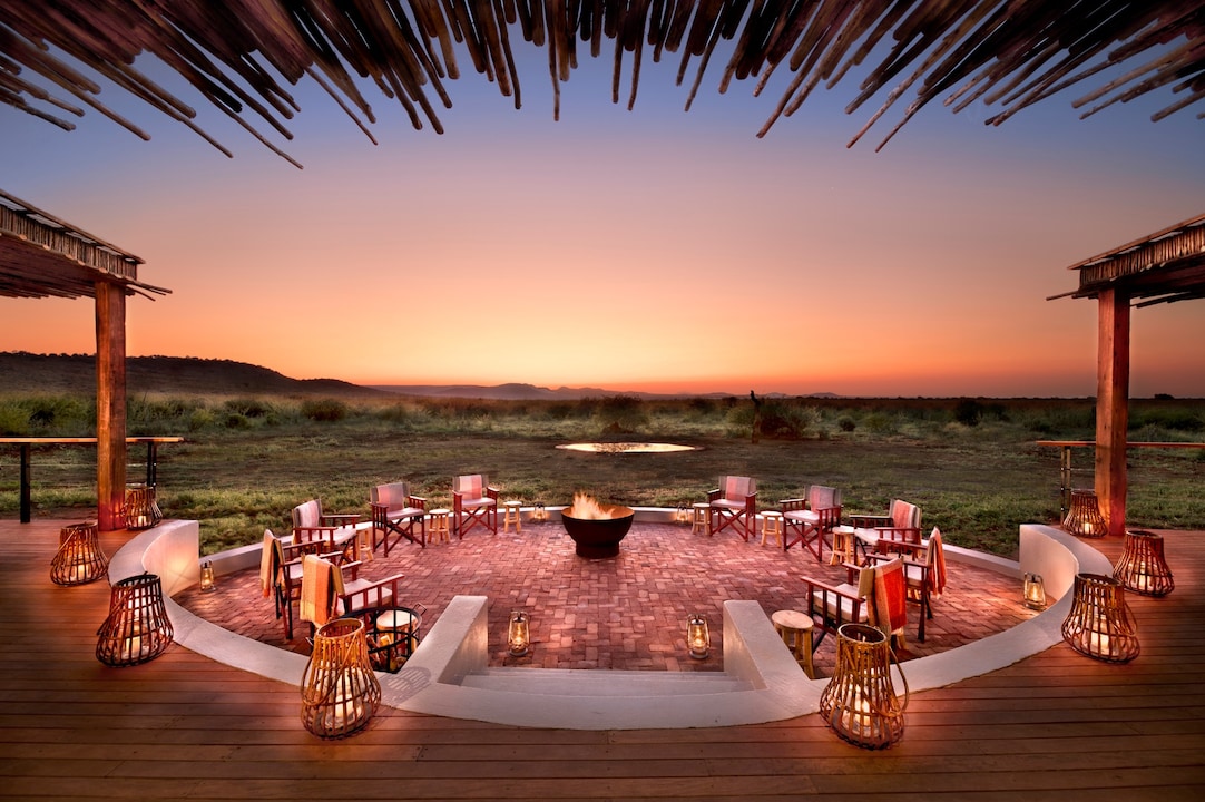 Morukuru Family Madikwe - Farm House firepit overlooking waterhole