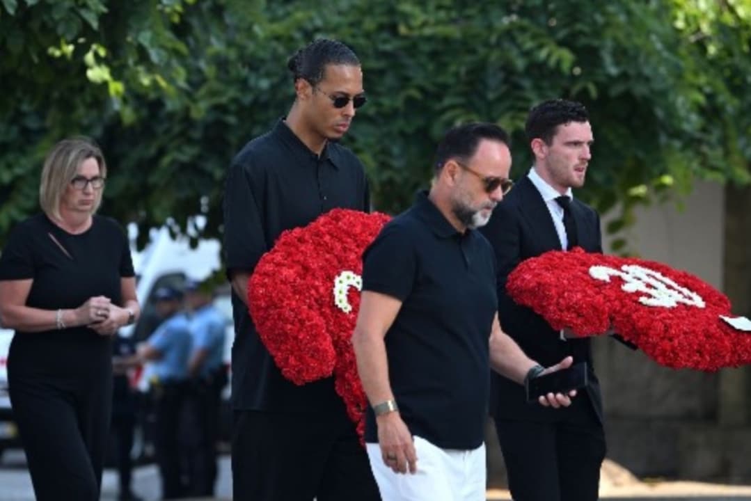 Virgil Van Dijk and Andy Robertson at the funeral of Diogo Jota and Andre Silva.